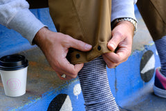 detail of the cuff of the tracko collab work pant in coyote