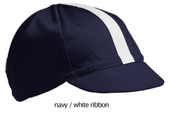 flat shot of our navy 4 panel cotton cap with white ribbon