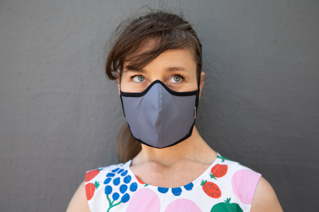 muriel is wearing the organic summer cotton mask in cool river