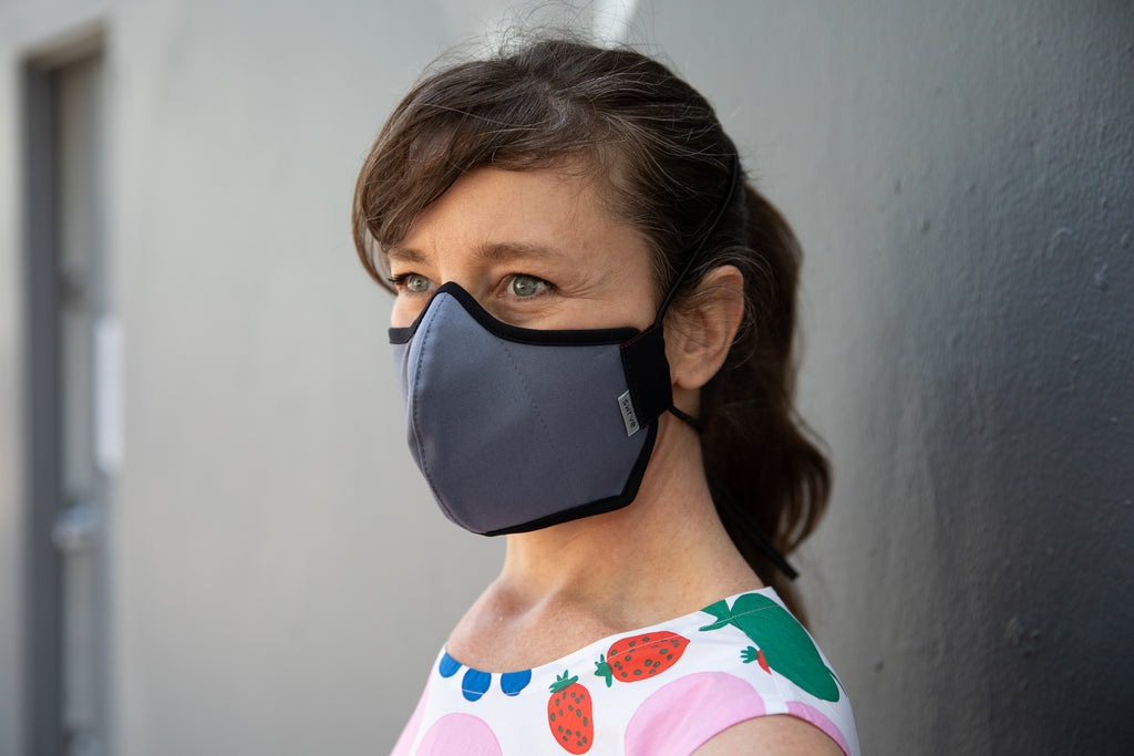 muriel is wearing the organic summer cotton mask in cool river