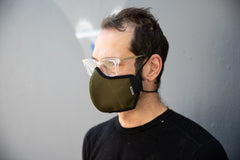 Matt is wearing the organic summer cotton mask in olive