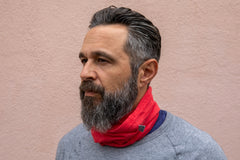 a model wearing the heather red neck gaiter