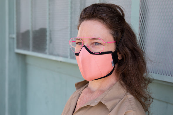 Muriel is wearing the mid-summer cotton mask in sherbet
