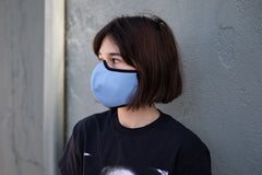 roxy wearing the organic summer cotton mask in robin's egg blue