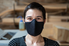 Roxy is wearing the mid-summer cotton mask in black
