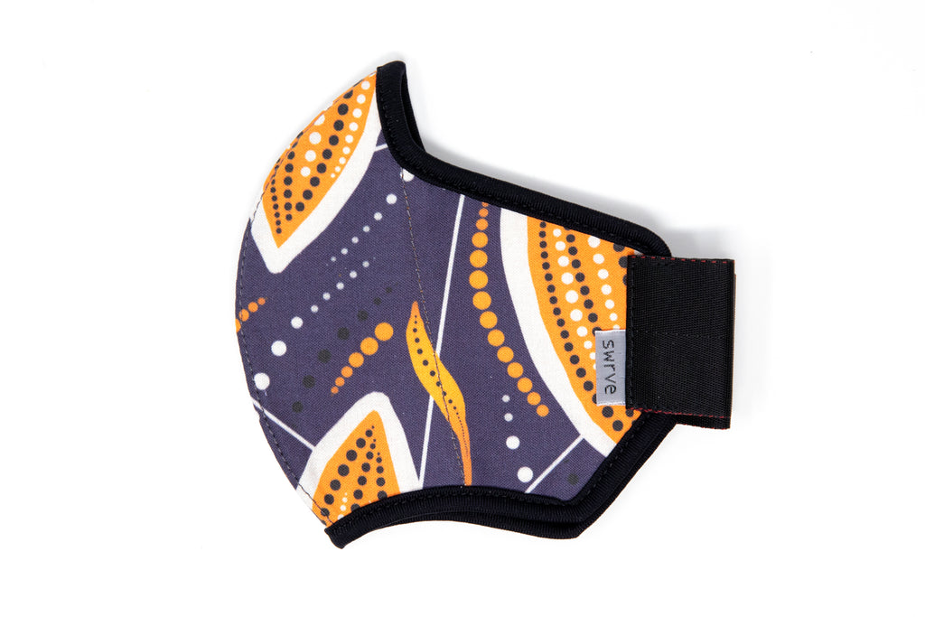 flat shot of the African cotton mask in cocoa pod in the adult fit