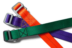 flat shot of the 1" belts in safety orange, purple rain, and tmnt green.