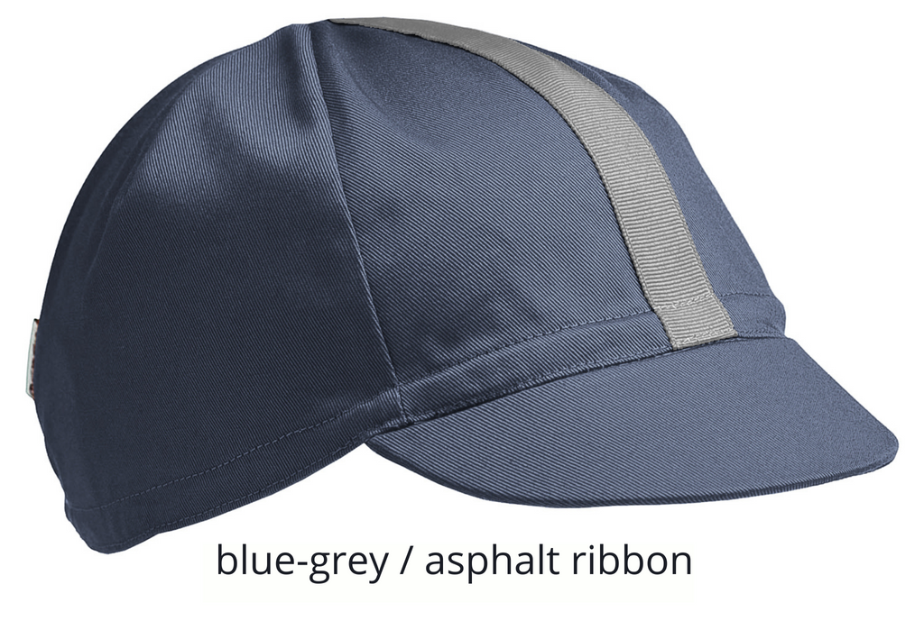 flat shot of the 4-panel cotton cap in blue-grey with an asphalt ribbon