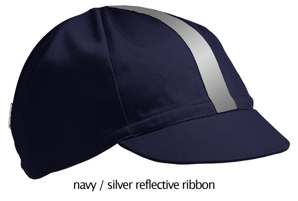 flat shot of our navy 4 panel cotton cap with silver reflective ribbon